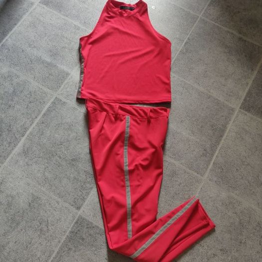 Red trousers and top set