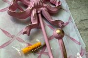 Large 13cm high x 10cm width metal bow hook in bubblegum pink with gold detail
