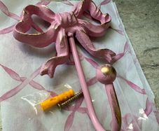 Large 13cm high x 10cm width metal bow hook in bubblegum pink with gold detail