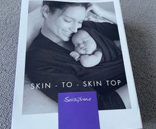 Seraphine baby wearing top size XS