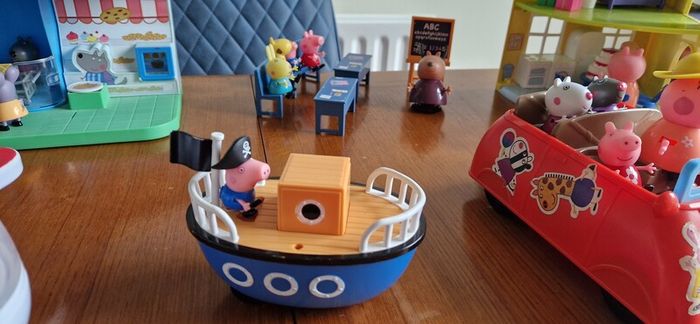 Assortment of peppa pig toys