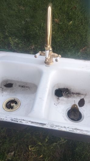 Double bowl ceramic sink with brass mixer tap