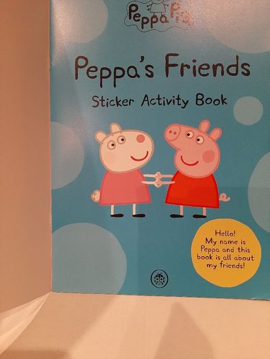 New peppa pig fleece with hood tags attached and sticker book