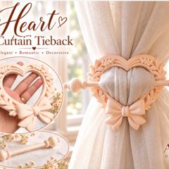 Heart-shaped curtain tieback with bow detail