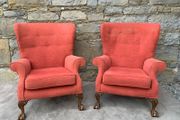 A pair of Chippendale Revival Country House wingback armchairs on Ball &amp; Claw feet.