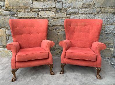 A pair of Chippendale Revival Country House wingback armchairs on Ball & Claw feet.