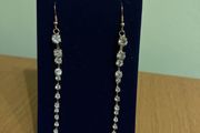 Gold tone sparkling earrings