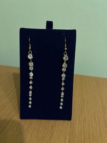 Gold tone sparkling earrings