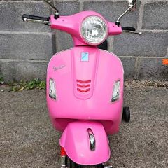 Pink Vespa GTS Super electric ride-on scooter