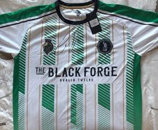 A brand new black forge away jersey (Signed by Conor McGregor)