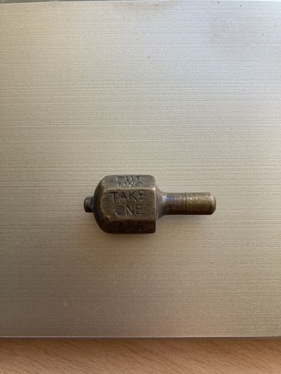 1920s brass Put & Take spinner