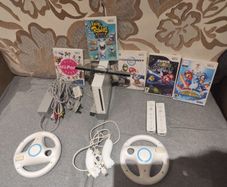 Wii bundle with Mario Kart, Wii Party, Mario Galaxy