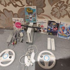 Wii bundle with Mario Kart, Wii Party, Mario Galaxy