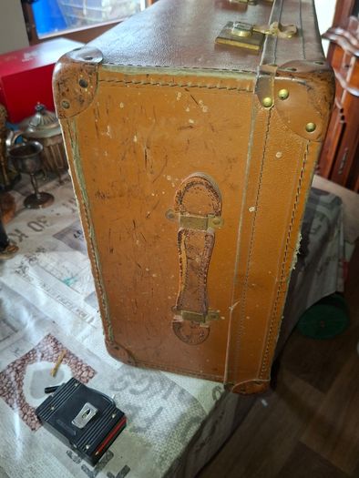 Vintage Hard Travel Suitcase, 1940s to 1950s, featuring a rigid textured brown exterior, metal corner guards, and a molded carry handle, Measurements are in the photo's, Postage Available or Collection