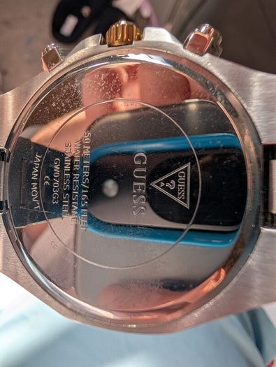 Mans guess watch with box
