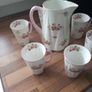 Shelley dainty rose and red daisy water jug and 6 beakers Image 9