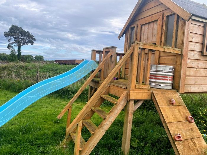 Playhouse with slide climbing frame stairs etc