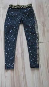 Superdry ladies sportswear leggings black, grey and gold design with stars size XS to small, approx 6 to 8