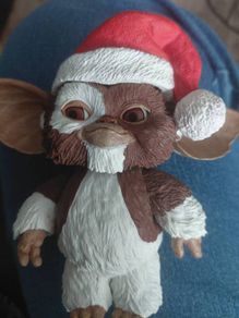 gizmo in a santa hat