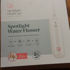 Spotlights water flosser