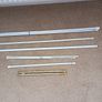 Cream pleated cafe nets and assorted tension rods to suit Image 4