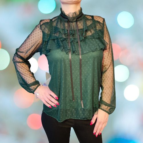 Lace blouse with a bow at the neck