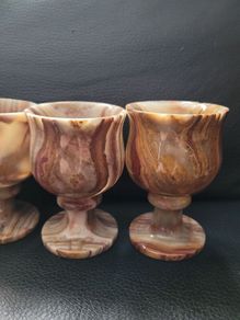 Set of four small onyx goblets