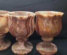 Set of four small onyx goblets