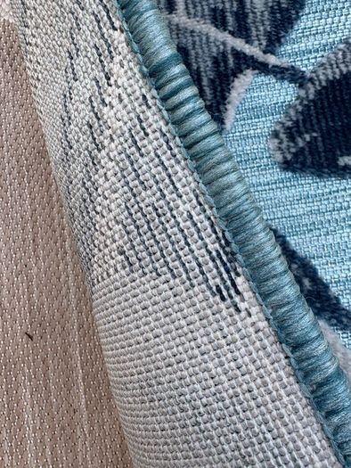 New 115cm x 170cm raised pile leaf tropical outdoor/indoor rug in distressed blue, grey and navy