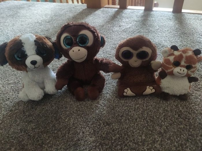 Bundle of 4 Ty Beanie Boos plush toys including the monkey phone holder stand