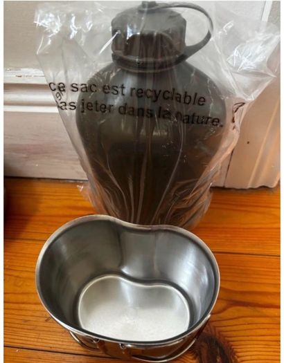 Genuine army-style metal water bottle with matching nesting cup. Military surplus