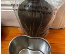 Genuine army-style metal water bottle with matching nesting cup. Military surplus