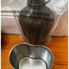 Genuine army-style metal water bottle with matching nesting cup. Military surplus