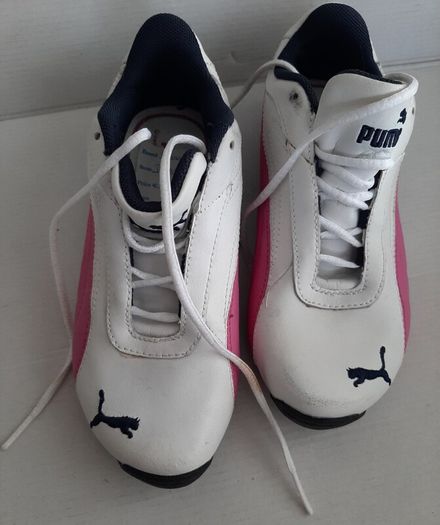New pink white and navy junior puma trainers