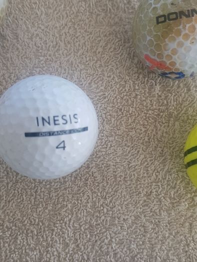 golf ball and tees