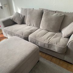 Grey sofa and pouf