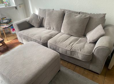 Grey sofa and pouf