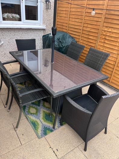 garden furniture table and chairs, parasol and parasol weight