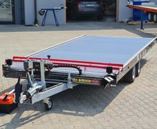 Tilt bed car transporter