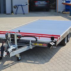 Tilt bed car transporter