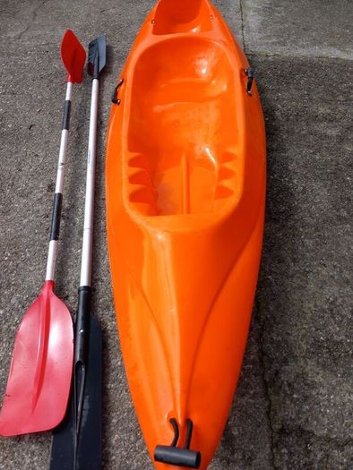 Kayak plus 2 paddles and 2 bouyancy aides