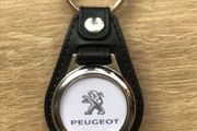 Leather Peugeot key ring with shopping trolley token/coin