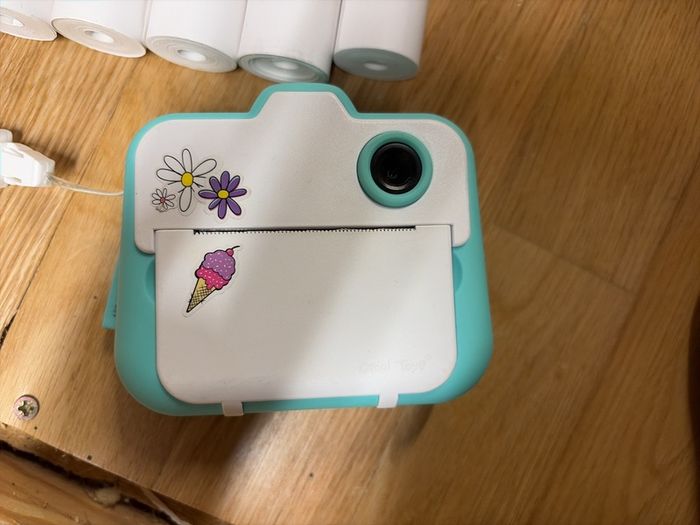 Instant camera & replacement rolls x18