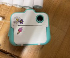 Instant camera & replacement rolls x18 & memory card
