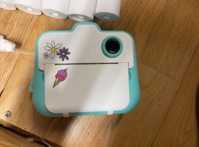 Instant camera & replacement rolls x18 & memory card