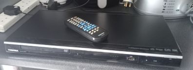 Toshiba DVD/CD/USB Player plus bag of dvd's