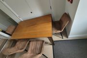 Dinning table solid wood.(No chairs).Very good, strong and stable table