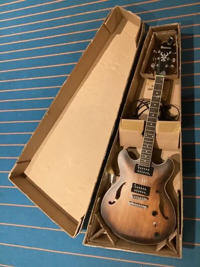 As new Ibanez AS53-TF electric guitar + amp.