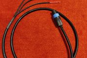 Cable to subwoofer REL with speakon high level.