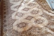 Vintage handwoven fringed rug.